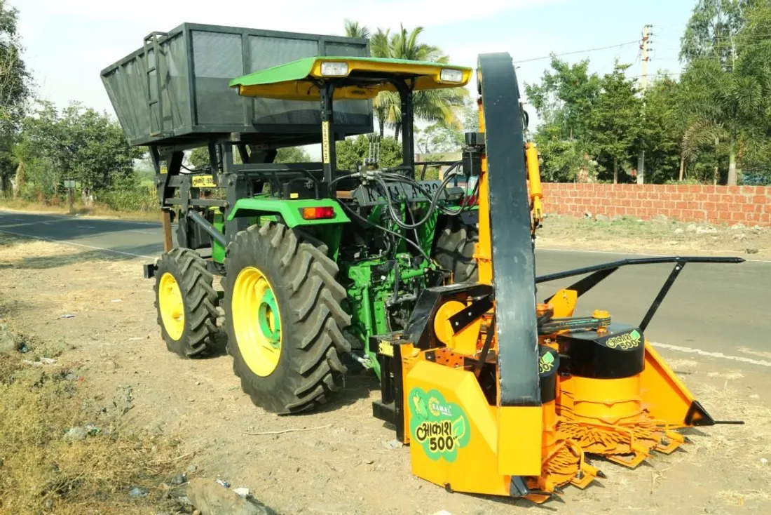 Cloud Agro tractor-mounted forage harvester working in a field